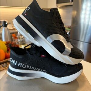 On Running Cloudboom Strike Black and White Shoes